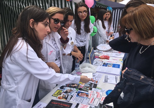 The principal Mª Vicenta Mestre attends the XIII Health Exhibition